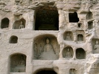 Buddha Figures in Small Caves