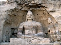 Buddha Figures in Rock Wall