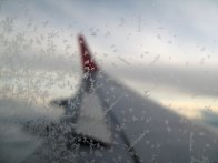 Frozen airplane window